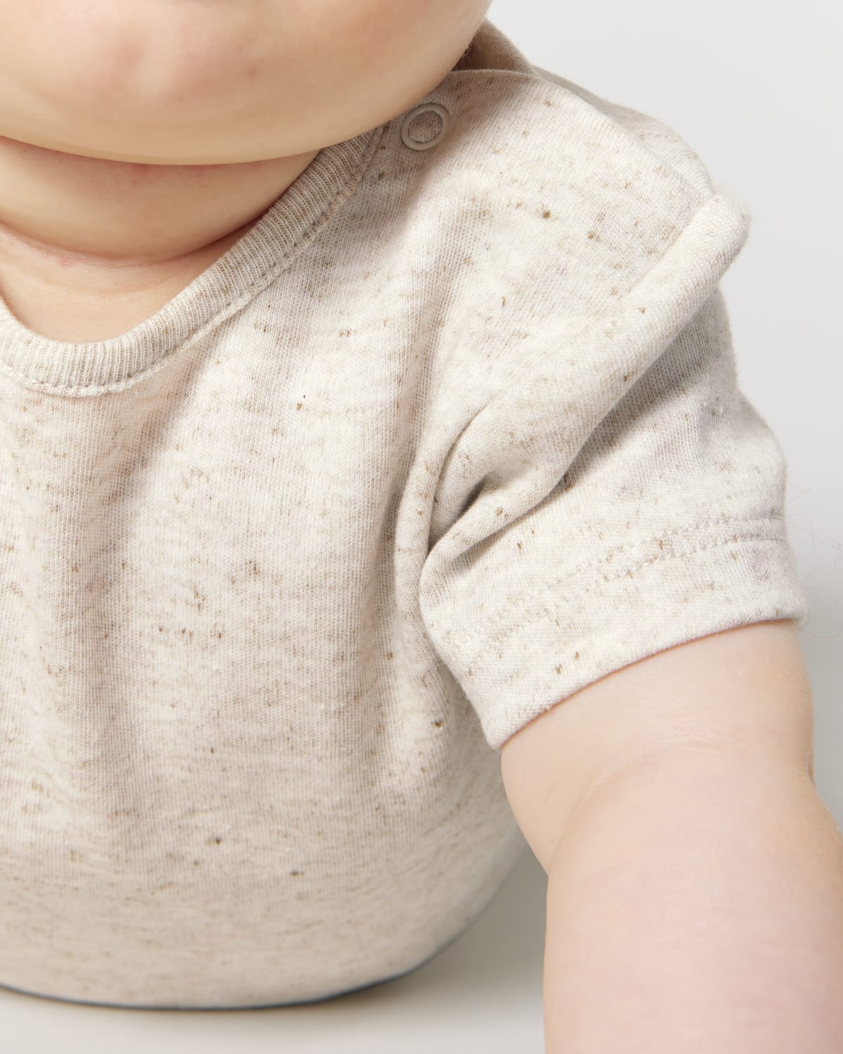 Der kurzärmelige Baby-Body